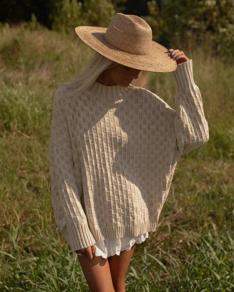 SWEATERS
